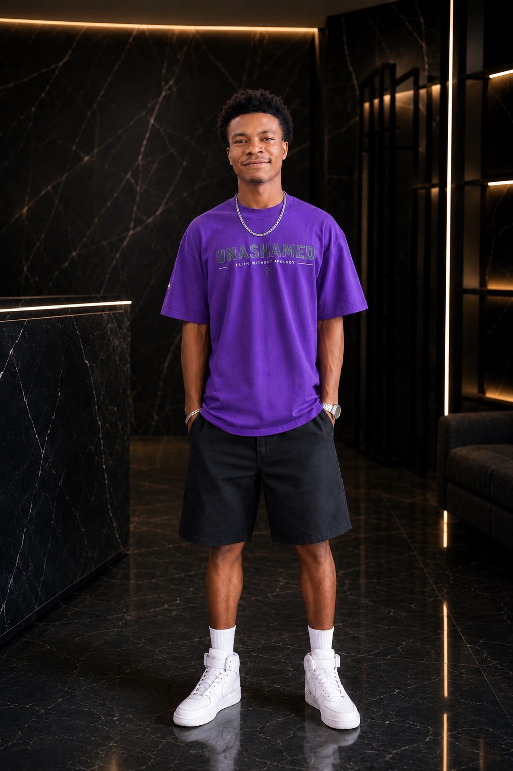 Model wearing the UNASHAMED tee