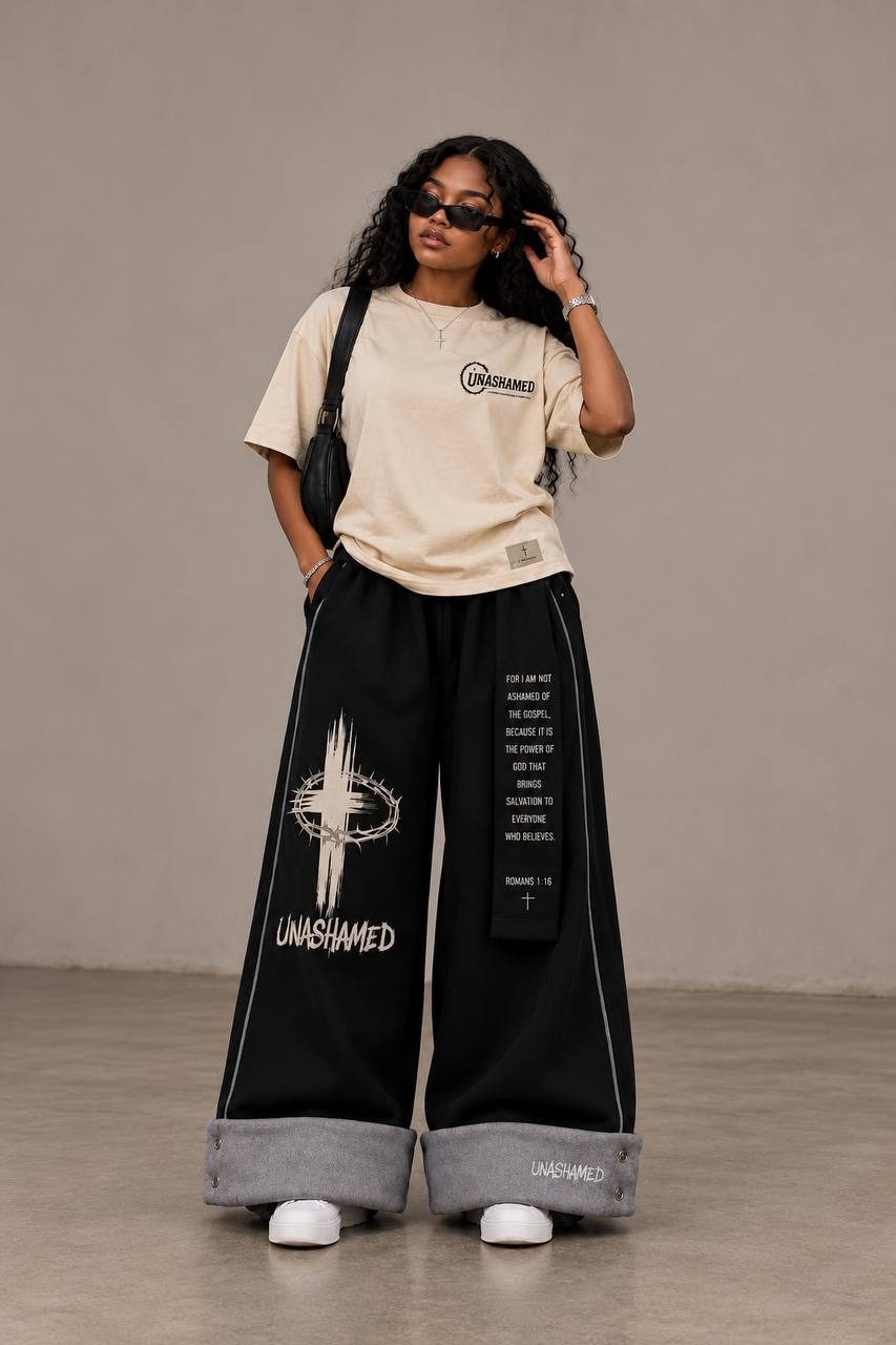 Woman in the cream David tee and Crown of Thorns cuffed pants