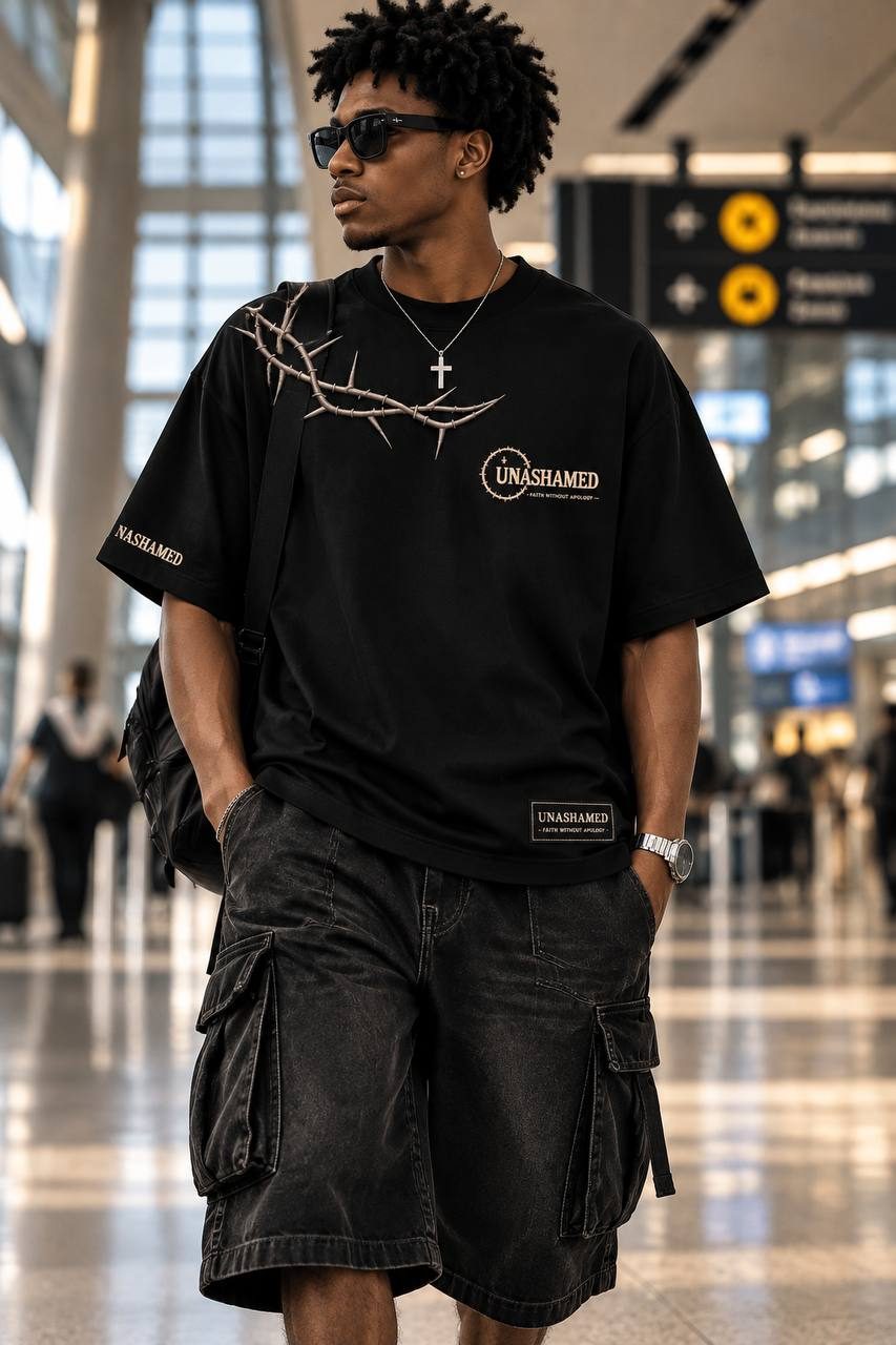 Man in the black David tee at the airport